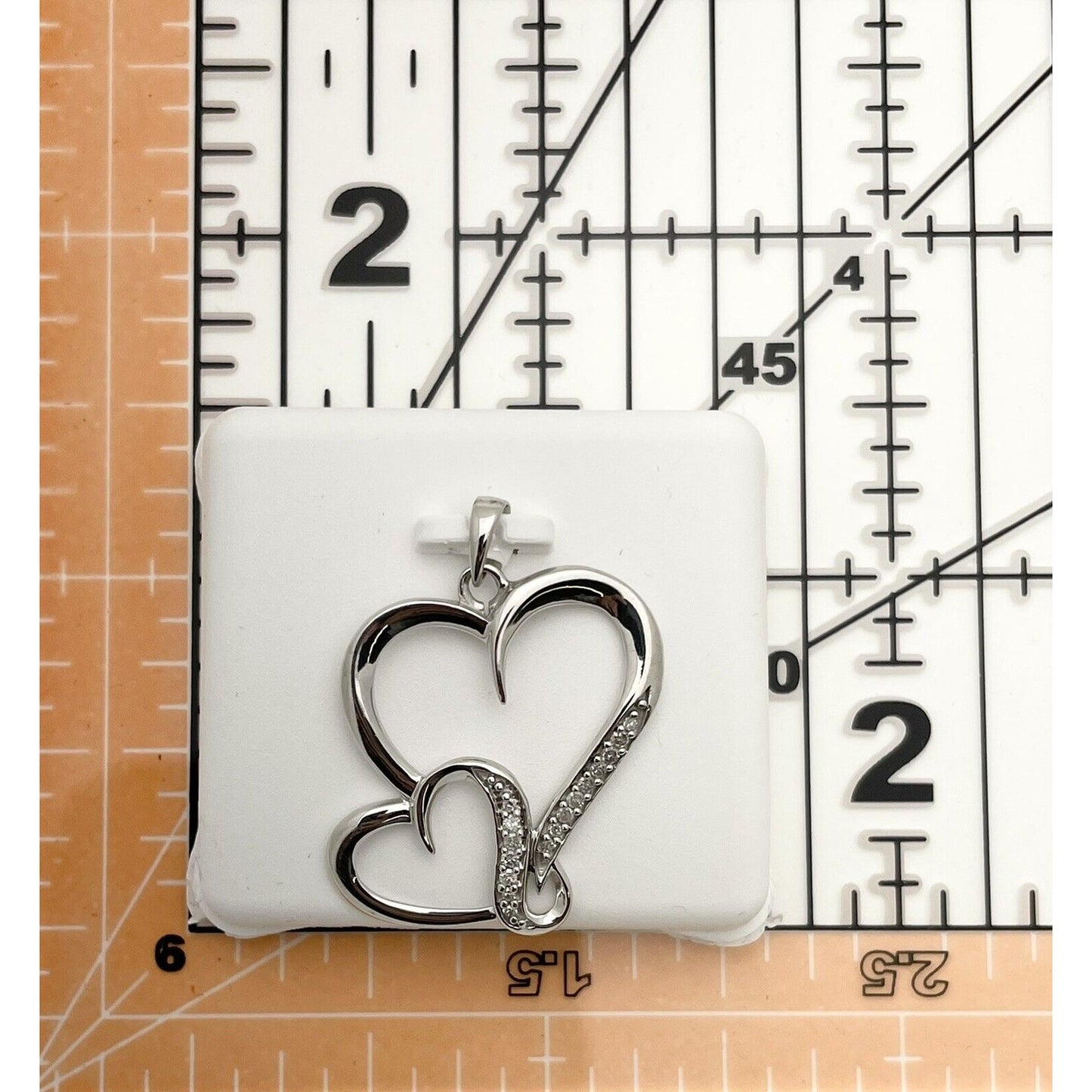 Sterling Silver & Diamond Double Heart Pendant 1/10 Ctw