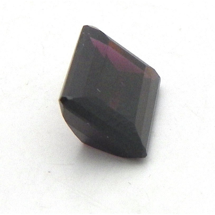 9ct MOZAMBIQUE RHODOLITE 10mm X 14mm EMERALD CUT STONE