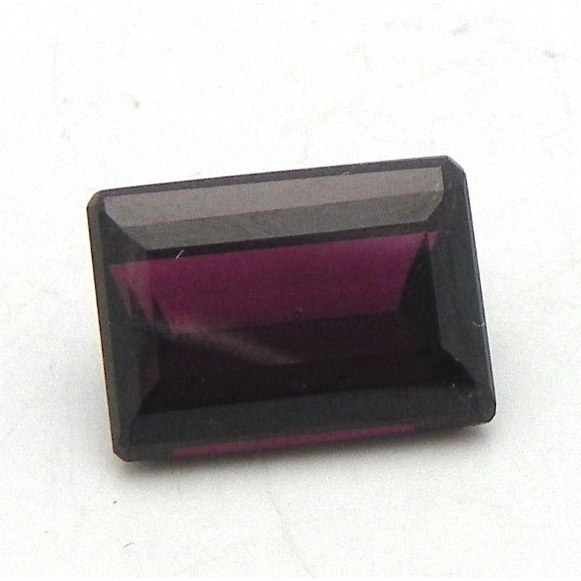 9ct MOZAMBIQUE RHODOLITE 10mm X 14mm EMERALD CUT STONE