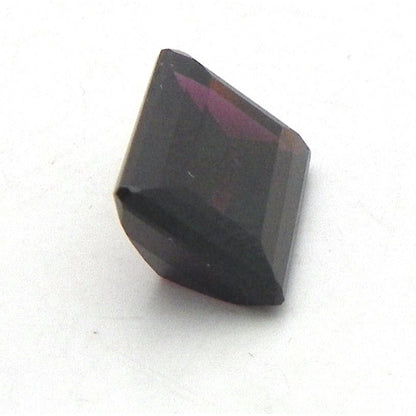 9ct MOZAMBIQUE RHODOLITE 10mm X 14mm EMERALD CUT STONE