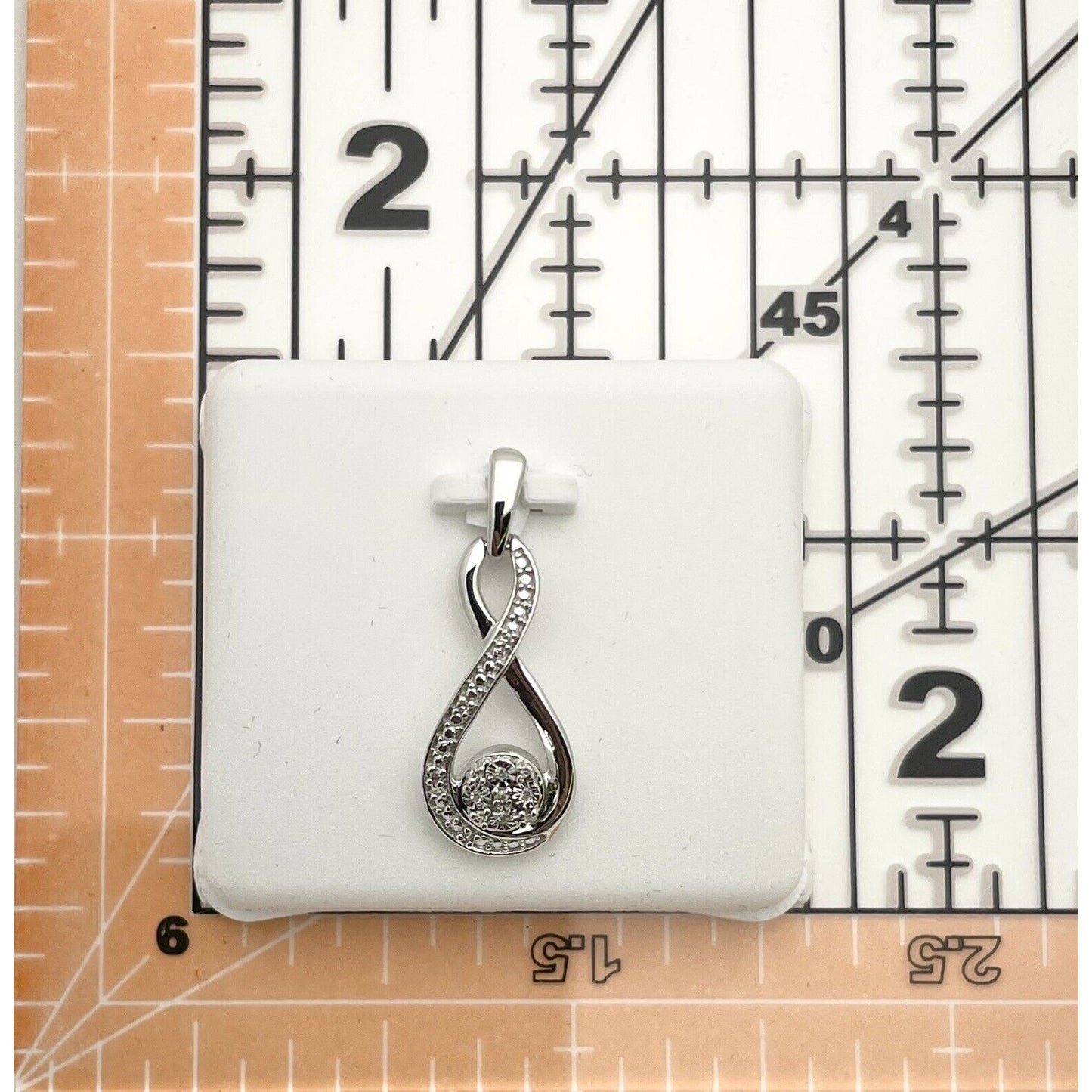 Sterling Silver Round 0.03 ctw Diamond Infinity Fashion Pendant