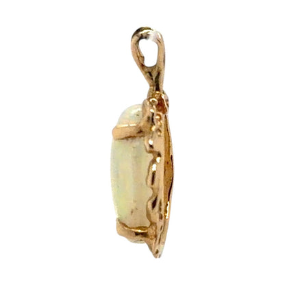Opal 14k Yellow Gold Oval Pendant 0.9g