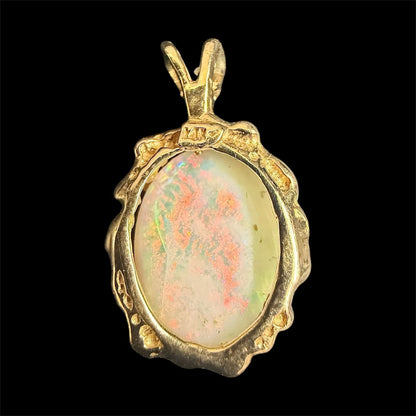Opal 14k Yellow Gold Oval Pendant 0.9g
