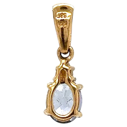 Tanzanite Solitaire with Diamond Accent 10k Yellow Gold Pendant 0.4g