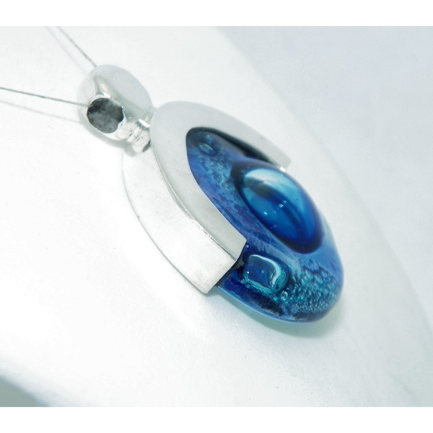 Sterling Silver & Blue Glass Pendant With Abstract Design