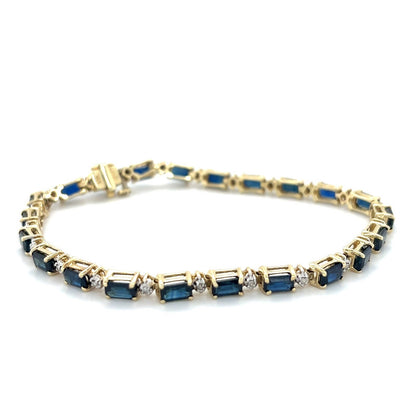 4.4ctw Sapphire & 1/10ctw Diamond 10K Yellow Gold 7in Bracelet 8.7g