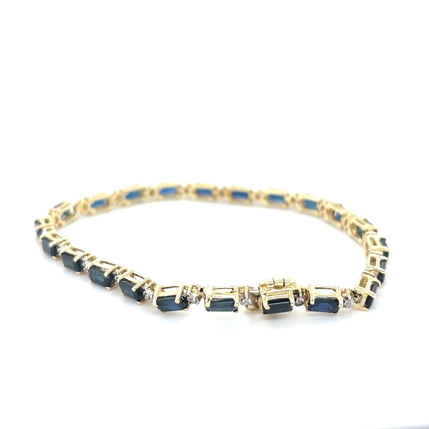 4.4ctw Sapphire & 1/10ctw Diamond 10K Yellow Gold 7in Bracelet 8.7g